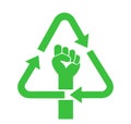 Recycle symbol and raised fist - Green revolution for climate, ecology and environment sustainability. Royalty Free Stock Photo