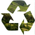Recycle symol with green lanscape concept of recylcing  and enviromental issues Royalty Free Stock Photo