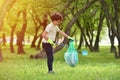 Recycle waste litter rubbish garbage trash junk clean training. Nature cleaning, volunteer ecology green concept. Young men and Royalty Free Stock Photo