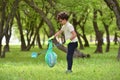 Recycle waste litter rubbish garbage trash junk clean training. Nature cleaning, volunteer ecology green concept. Young men and Royalty Free Stock Photo