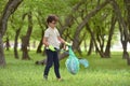 Recycle waste litter rubbish garbage trash junk clean training. Nature cleaning, volunteer ecology green concept. Young men and Royalty Free Stock Photo