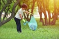Recycle waste litter rubbish garbage trash junk clean training. Nature cleaning, volunteer ecology green concept. Young men and Royalty Free Stock Photo