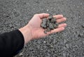 Recycled asphalt crumb is used on the edge of the new cycle path and in the subsoil of the asphalt road. between the field and the