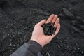 Recycled asphalt from road milling on a large pile at a landfill. traces of a grab from an excavator spoon. its color and structur