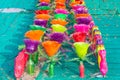 Recycled colorful plastic flowers made from plastic bottles to decorate as flowers in the garden.