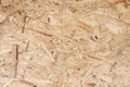 Recycled compressed wood chippings board. The texture of the plywood panel Royalty Free Stock Photo