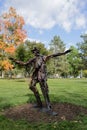 recycled metal art sculpture of a skater boy girl