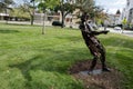 recycled metal art sculpture of a skater boy girl ,