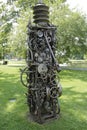 Recycled metal art tower .. wheels, gears, gear arms,