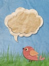 Recycled paper craft bird with speech bubble Royalty Free Stock Photo