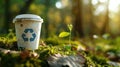 The recycled paper cup in forest.AI generated image Royalty Free Stock Photo
