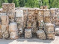 Recycled paper factory. Bales of cardboard, boxes and papers prepared to be recycled in a warehouse