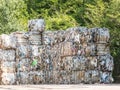 Recycled paper factory. Bales of cardboard, boxes and papers prepared to be recycled in a warehouse