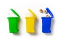 Recycled paper. Yellow, green, blue dustbin for recycle plastic and glass can trash isolated on white background. Bin container Royalty Free Stock Photo