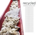 recycled waste of cellophane films, wrappers, bags, etc. on the conveyor for shredding