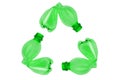Recyclig symbol made of green plastic bottle on white background