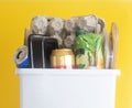 Recycling bin full of recyclable things . Royalty Free Stock Photo