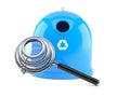 Recycling bin with magnifying glass Royalty Free Stock Photo