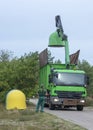 Recycling bins being emptied at a summer resort