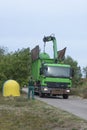 Recycling bins being emptied at a summer resort