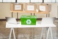 Recycling box amidst laptop Royalty Free Stock Photo