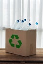 Recycling box filled with clear plastic containers Royalty Free Stock Photo