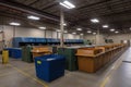 recycling center, with bins and sorters for different types of recyclables