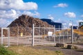 Recycling centre from behind a fence. Royalty Free Stock Photo