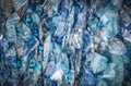 Recycling concept. The problem of ecology, environmental pollution. Background of plastic bottles transparent blue ne Royalty Free Stock Photo