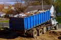 Recycling container trash dumpsters being full with garbage Royalty Free Stock Photo