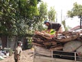 Yogyakarta, Indonesia November-22-2020: workers in landfills carrying paper waste