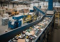 Recycling facility featuring a conveyor belt system transporting Royalty Free Stock Photo