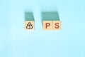 Recycling icon number 6 for PS or polystyrene symbol on wooden blocks flat lay.