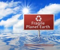 Recycling Road Sign in Flooded Area Royalty Free Stock Photo