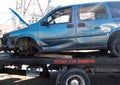 Recycling scrap car removal service for future dismantling and metal and parts reuse.