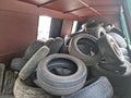 Recycling scrap tires from passenger cars in a container