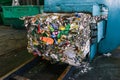 Recycling and sorting of household waste at the plant. Pressed trash for further processing. Recycling and storage of Royalty Free Stock Photo