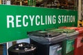 Recycling Station large sign with coloured bins for recycling of waste garbage