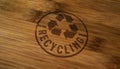 Recycling symbol stamp and stamping Royalty Free Stock Photo