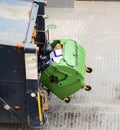 Recycling truck picking up bin Royalty Free Stock Photo