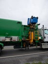 Recycling truck picking up bin Royalty Free Stock Photo