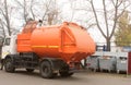 Recycling truck picking up grey garbage metal bins Royalty Free Stock Photo