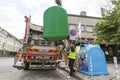 Recycling truck picking up trash bins Royalty Free Stock Photo