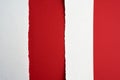 Red abstract background with torn white paper stripes Royalty Free Stock Photo