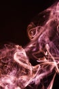 Red abstract shaped smoke against black background. Abstract background Royalty Free Stock Photo
