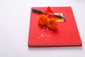 Red accounting note book , diya, and flower rangoli on white background Royalty Free Stock Photo