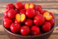 Red acerola - malpighia glabra, tropical fruit in wicker busket