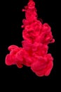 Red acrylic paint in water. Royalty Free Stock Photo