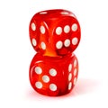 Red acrylic transparent dice for games. Two gambling translucent dices one on top of the other, isolated on white background, Royalty Free Stock Photo