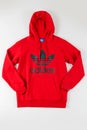 Red Adidas originals hoodie jumper isolated on white background. Royalty Free Stock Photo